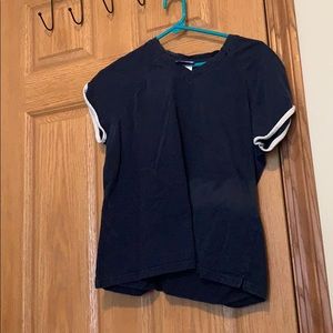Navy blue shirt with white stripes on the sleeves